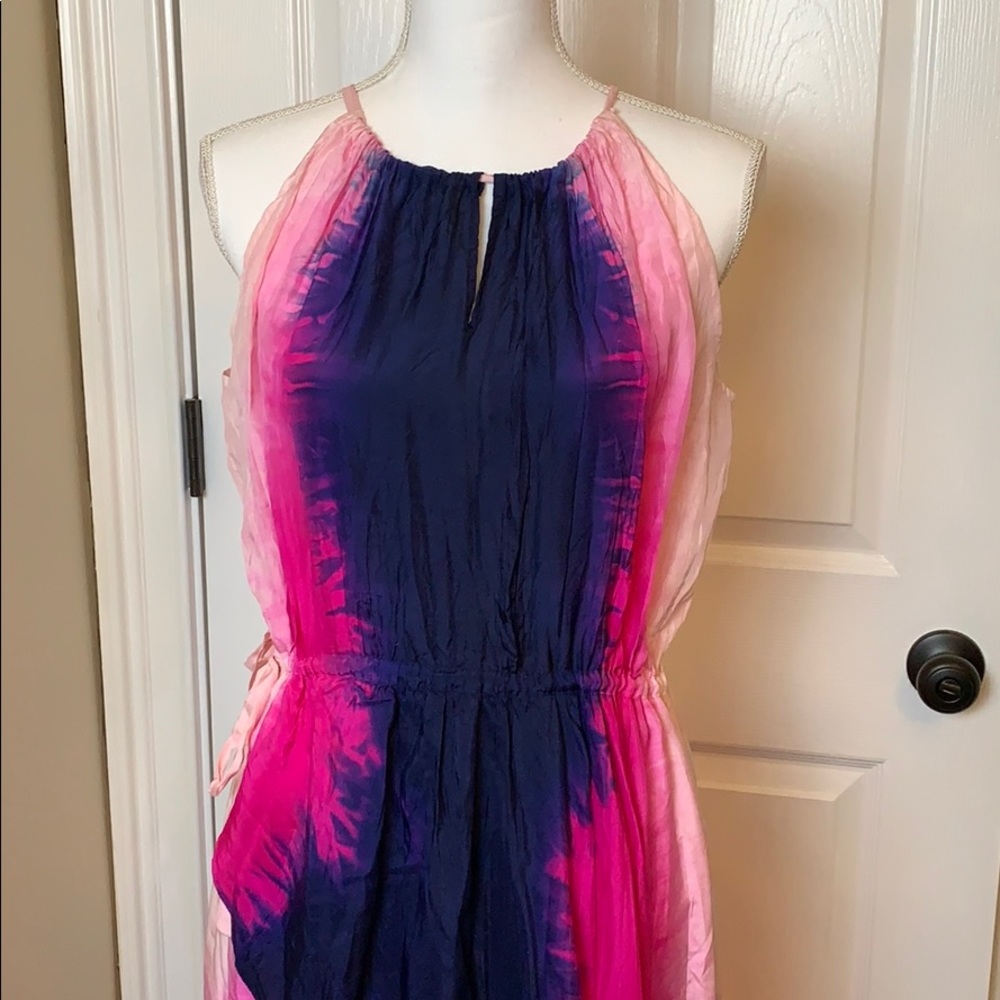 Stunning silk adjustable halter dress.